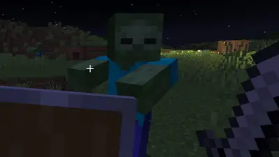 Survival mode gameplay at night in a voxel block game